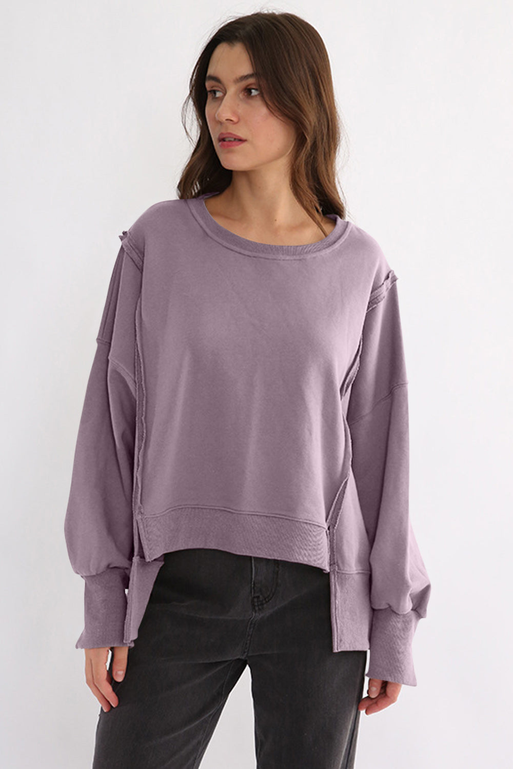 LIZAKOSHT  -  Exposed Seam High-Low Long Sleeve Sweatshirt