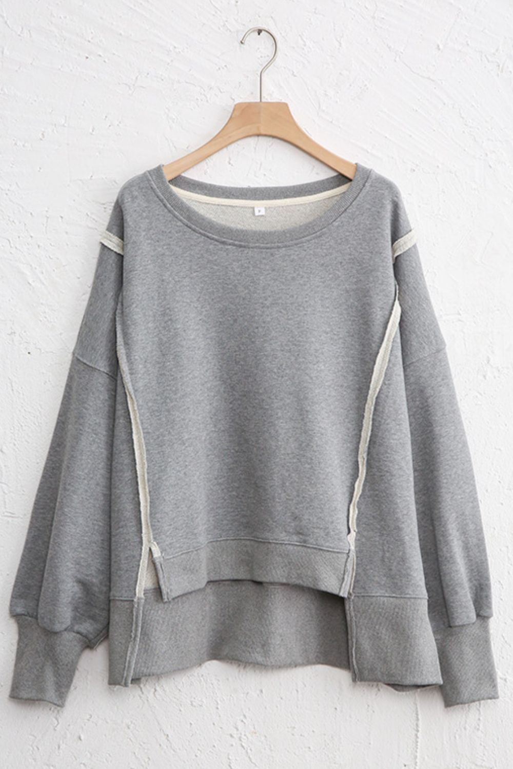 LIZAKOSHT  -  Exposed Seam High-Low Long Sleeve Sweatshirt
