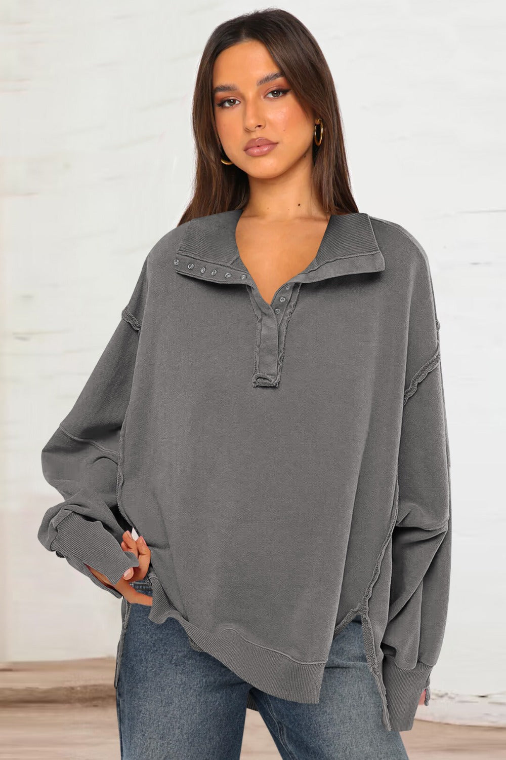 LIZAKOSHT  -  Exposed Seam Side Slit Long Sleeve Sweatshirt