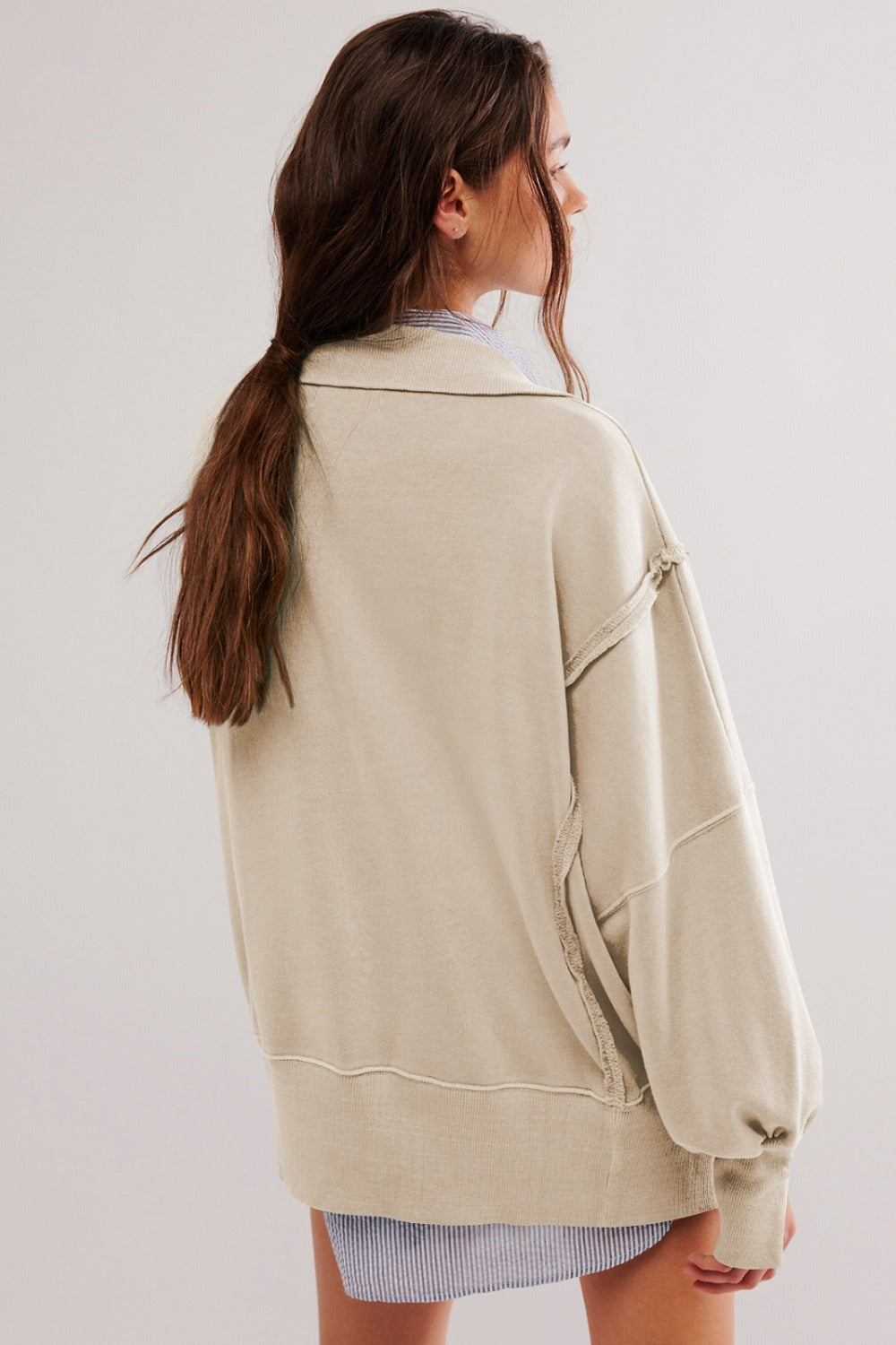 LIZAKOSHT  -  Exposed Seam Side Slit Long Sleeve Sweatshirt