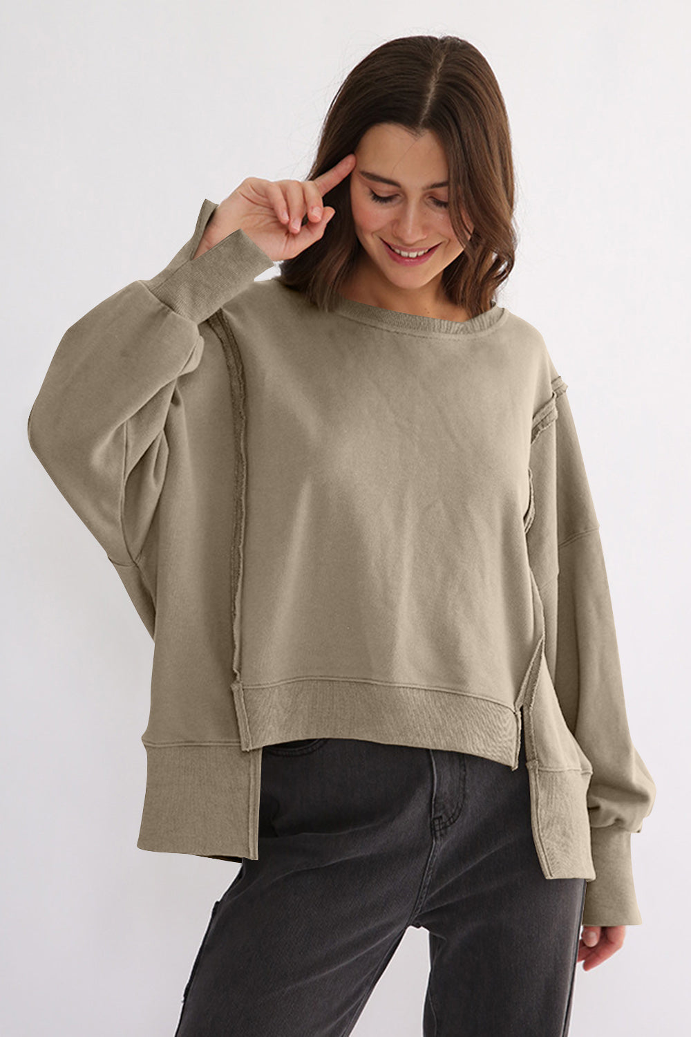 LIZAKOSHT  -  Exposed Seam High-Low Long Sleeve Sweatshirt