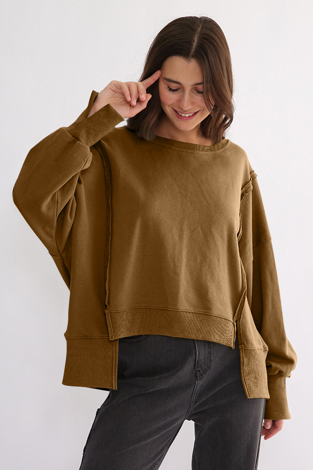 LIZAKOSHT  -  Exposed Seam High-Low Long Sleeve Sweatshirt
