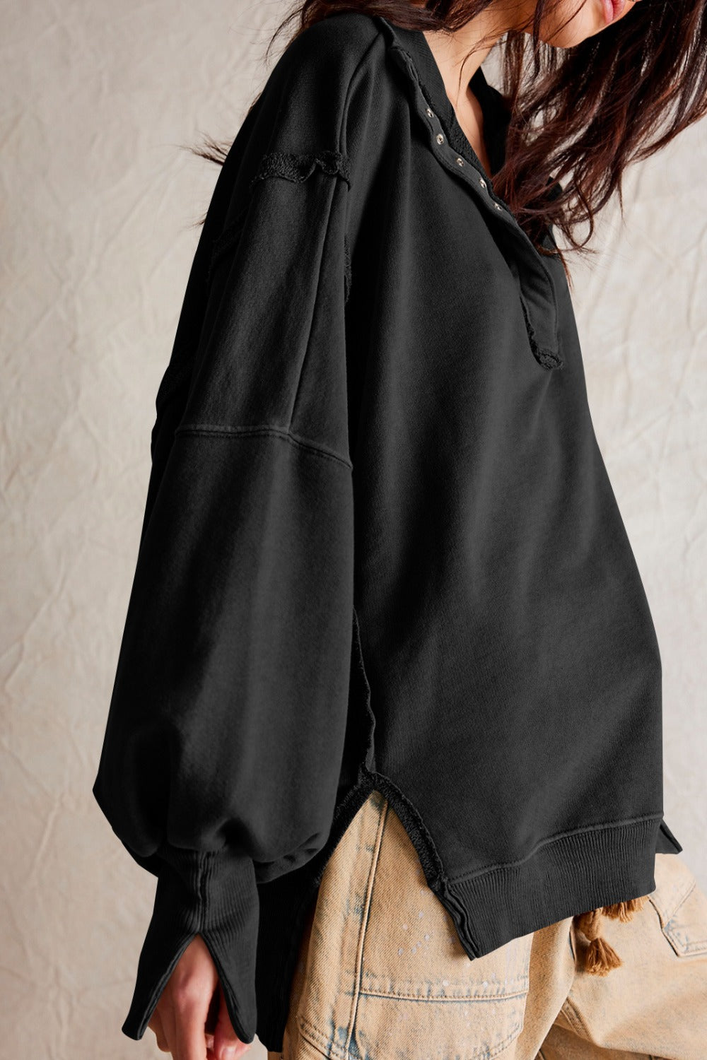 LIZAKOSHT  -  Exposed Seam Side Slit Long Sleeve Sweatshirt