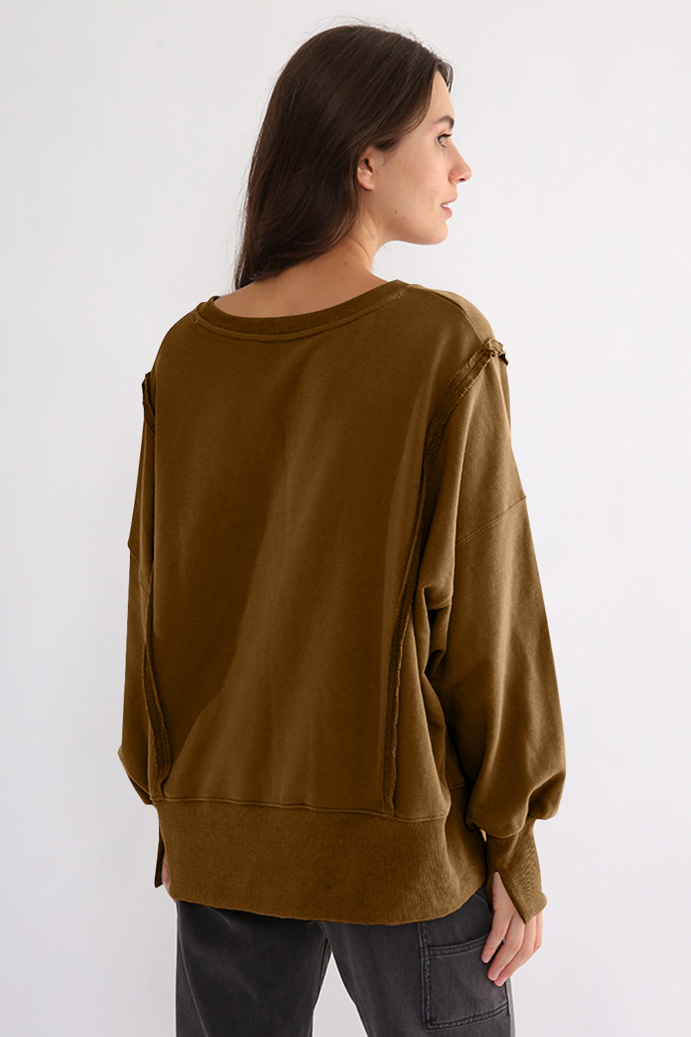 LIZAKOSHT  -  Exposed Seam High-Low Long Sleeve Sweatshirt