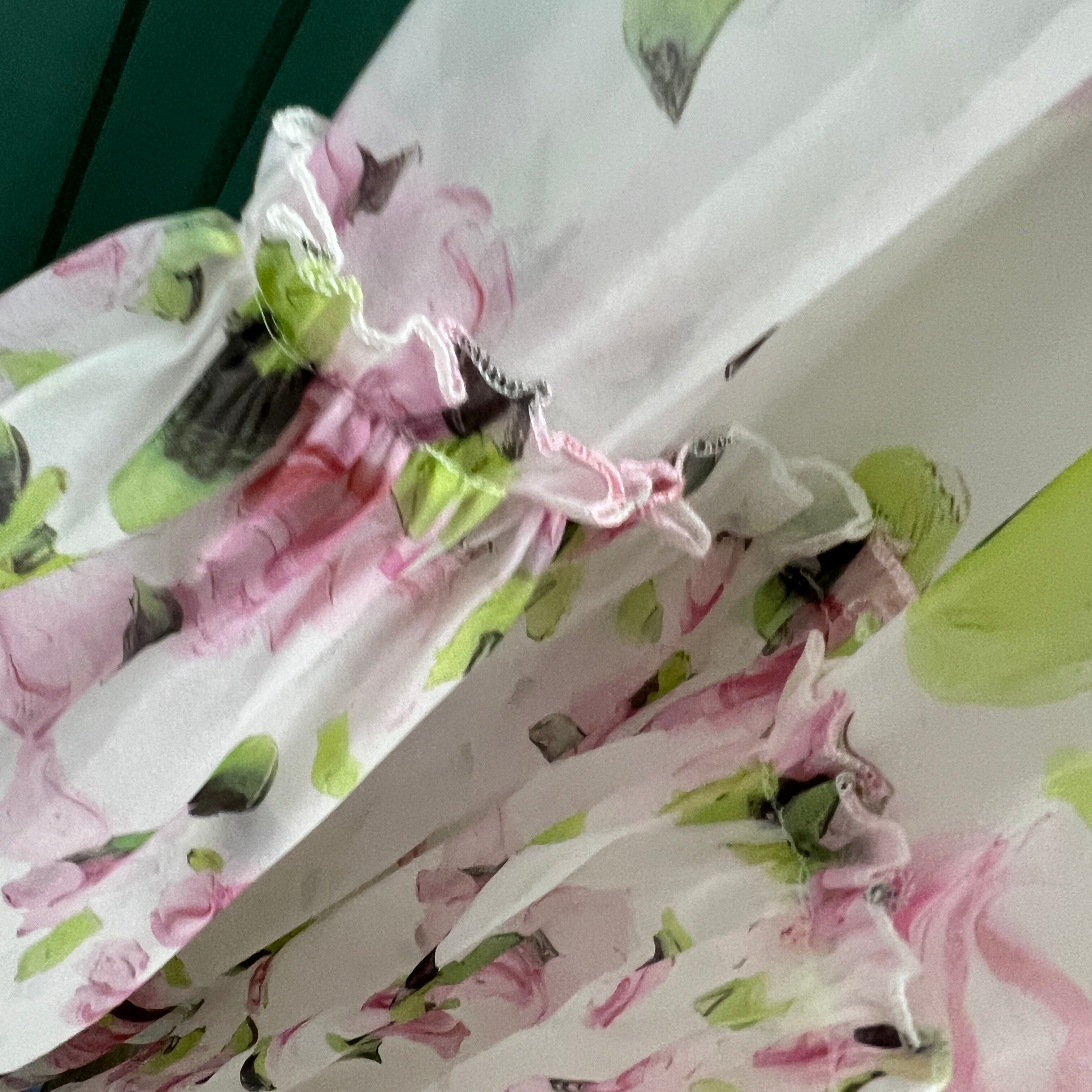 Lizakosht The French court is gentle and shoulders, wearing a light luxury niche big skirt, bubble princess sleeve tea break printed dress